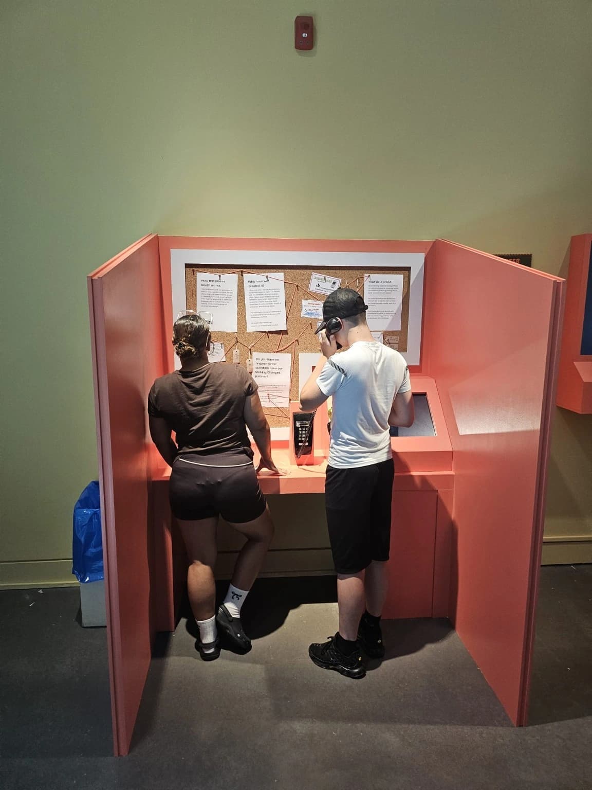 Learners completing an interactive communication activity during an educational visit.