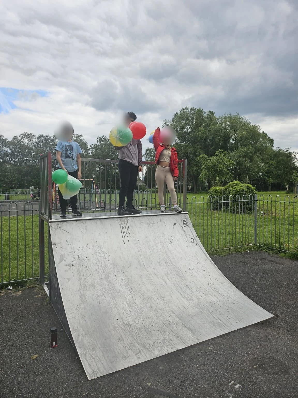Learners taking part in an outdoor team activity at a local skatepark.